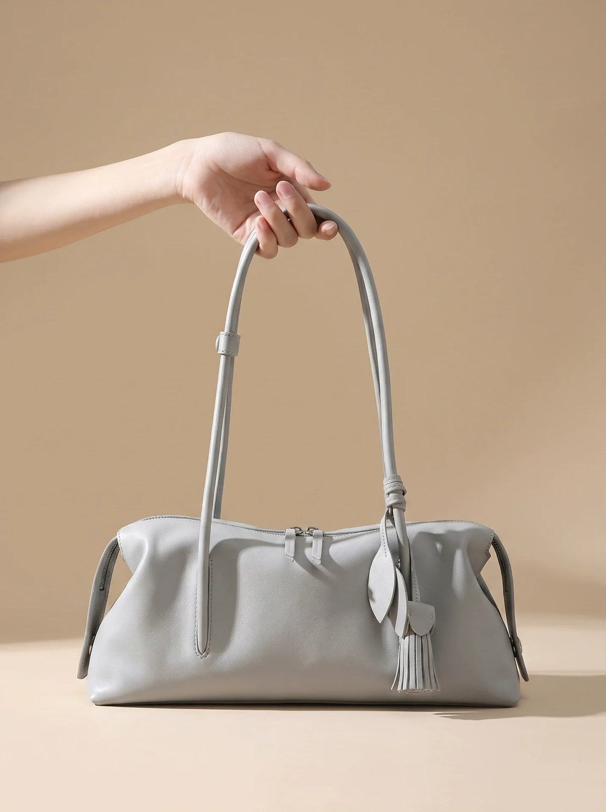 Dove Grey Soft Leather Pillow Shoulder Bag with Tassel Charm